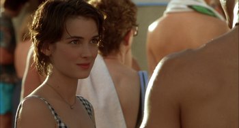 Movie still from “How to Make an American Quilt” (1995), directed by Jocelyn Moorhouse – A person wearing a necklace; Close Up shot, Over the shoulder angle