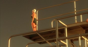 Movie still from “How to Make an American Quilt” (1995), directed by Jocelyn Moorhouse – A woman standing on the side of a diving board; Wide shot, Low angle
