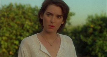Movie still from “How to Make an American Quilt” (1995), directed by Jocelyn Moorhouse – A person wearing a white shirt; Close Up shot, Over the shoulder angle