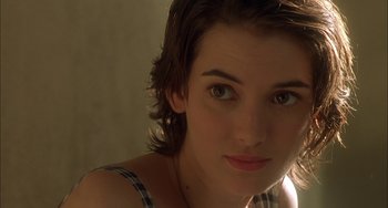 Movie still from “How to Make an American Quilt” (1995), directed by Jocelyn Moorhouse – A woman's face in the sunlight; Close Up shot, Over the shoulder angle