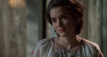 Movie still from “How to Make an American Quilt” (1995), directed by Jocelyn Moorhouse – A person wearing a dress; Close Up shot, Over the shoulder angle