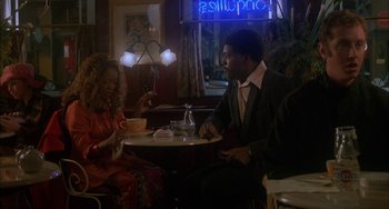 Movie still from “How to Make an American Quilt” (1995), directed by Jocelyn Moorhouse – A man and a woman sitting at a table; Medium shot, Over the shoulder angle