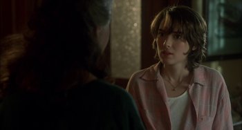 Movie still from “How to Make an American Quilt” (1995), directed by Jocelyn Moorhouse – A woman in a plaid shirt talking to another woman; Close Up shot, Over the shoulder angle