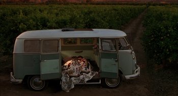 Movie still from “How to Make an American Quilt” (1995), directed by Jocelyn Moorhouse – An old van with a bed in the back; Wide shot, High angle
