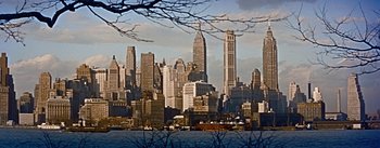 Movie still from “How to Marry a Millionaire” (1953), directed by Jean Negulesco – A view of a large city from across the water; Extreme Wide shot, High angle