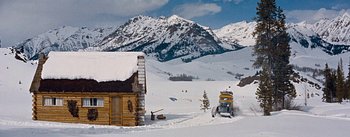 Movie still from “How to Marry a Millionaire” (1953), directed by Jean Negulesco – A snow vehicle driving down a snow covered slope; Extreme Wide shot, High angle