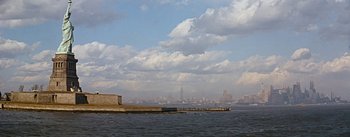 Movie still from “How to Marry a Millionaire” (1953), directed by Jean Negulesco – A view of a body of water and a city skyline; Extreme Wide shot, Low angle