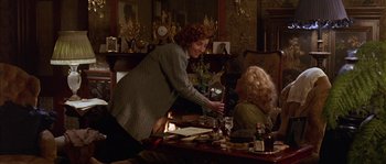 Movie still from “Howards End” (1992), directed by James Ivory – Two women sitting at a dining room table; Medium shot, Over the shoulder angle