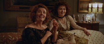 Movie still from “Howards End” (1992), directed by James Ivory – Two women sitting next to each other on a couch; Close Up shot, Over the shoulder angle