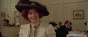 Movie still from “Howards End” (1992), directed by James Ivory – A person wearing a hat; Close Up shot, Low angle