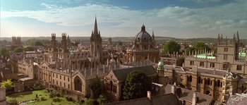 Movie still from “Howards End” (1992), directed by James Ivory – An aerial view of a city with many buildings and spires; Extreme Wide shot, High angle
