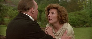 Movie still from “Howards End” (1992), directed by James Ivory – An older man and a younger woman in an outdoor setting; Close Up shot, Over the shoulder angle