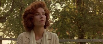Movie still from “Howards End” (1992), directed by James Ivory – A person with curly red hair; Close Up shot, Low angle