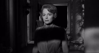 Movie still from “Hush...Hush, Sweet Charlotte” (1964), directed by Robert Aldrich – Black and white photograph of a woman in a room; Close Up shot, Low angle
