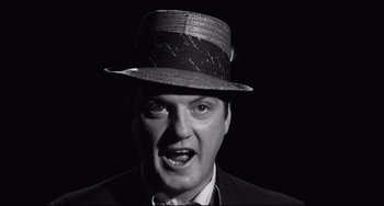 Movie still from “Hush...Hush, Sweet Charlotte” (1964), directed by Robert Aldrich – A black and white photo of a man wearing a hat; Close Up shot, Low angle