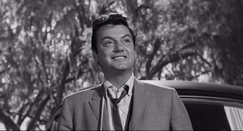 Movie still from “Hush...Hush, Sweet Charlotte” (1964), directed by Robert Aldrich – Black and white photograph of a man wearing a suit and tie; Close Up shot, Low angle