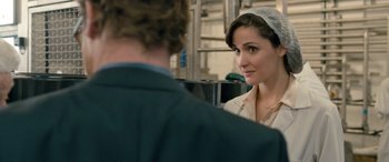 Movie still from “I Give It a Year” (2013), directed by Dan Mazer – A woman wearing a veil looking at a man in a suit; Close Up shot, Over the shoulder angle