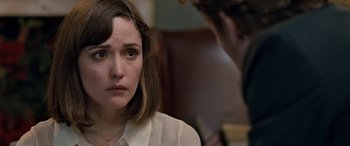 Movie still from “I Give It a Year” (2013), directed by Dan Mazer – A woman sitting in front of a mirror looking sad; Close Up shot, Over the shoulder angle