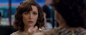 Movie still from “I Give It a Year” (2013), directed by Dan Mazer – A person looking at a mirror; Close Up shot, Over the shoulder angle