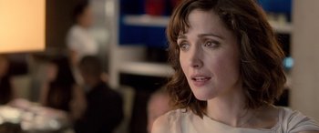 Movie still from “I Give It a Year” (2013), directed by Dan Mazer – A person looking at the camera; Close Up shot, Over the shoulder angle