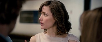 Movie still from “I Give It a Year” (2013), directed by Dan Mazer – A person wearing a white shirt; Close Up shot, Over the shoulder angle