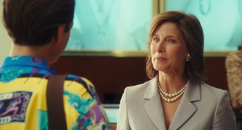 Movie still from “I Love You Phillip Morris” (2009), directed by John Requa – A woman in a gray jacket and a man in a white suit; Close Up shot, Over the shoulder angle