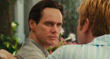 Movie still from “I Love You Phillip Morris” (2009), directed by John Requa – A person wearing a shirt; Close Up shot, Over the shoulder angle