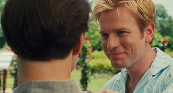 Movie still from “I Love You Phillip Morris” (2009), directed by John Requa – A man with blonde hair is looking at another man with short blond hair; Close Up shot, Over the shoulder angle