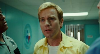 Movie still from “I Love You Phillip Morris” (2009), directed by John Requa – A person wearing a yellow shirt; Close Up shot, Low angle