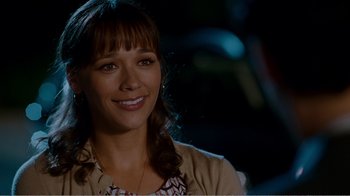 Movie still from “I Love You, Man” (2009), directed by John Hamburg – A woman smiles brightly at the camera; Close Up shot, Over the shoulder angle