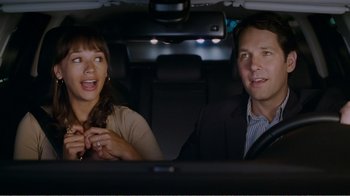 Movie still from “I Love You, Man” (2009), directed by John Hamburg – A man and a woman sitting in the back seat of a car; Medium shot, Over the shoulder angle