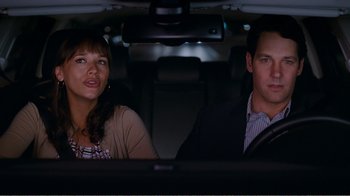 Movie still from “I Love You, Man” (2009), directed by John Hamburg – A man and a woman sitting in the back seat of a car; Medium shot, Over the shoulder angle