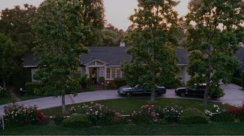 Movie still from “I Love You, Man” (2009), directed by John Hamburg – A house that has a lot of flowers in the yard; Extreme Wide shot, High angle