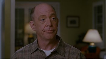 Movie still from “I Love You, Man” (2009), directed by John Hamburg – An older man is looking at the camera; Close Up shot, Over the shoulder angle