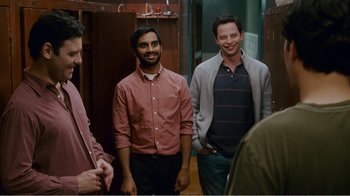 Movie still from “I Love You, Man” (2009), directed by John Hamburg – A group of men standing next to each other in a room; Medium shot, Over the shoulder angle