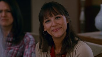 Movie still from “I Love You, Man” (2009), directed by John Hamburg – A person smiling for the camera; Close Up shot, Over the shoulder angle