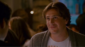 Movie still from “I Love You, Man” (2009), directed by John Hamburg – A person wearing a white shirt; Close Up shot, Over the shoulder angle