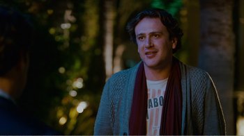 Movie still from “I Love You, Man” (2009), directed by John Hamburg – A young man wearing a sweater and a scarf; Medium shot, Over the shoulder angle