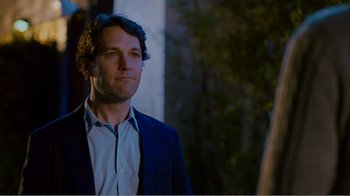 Movie still from “I Love You, Man” (2009), directed by John Hamburg – A person wearing a suit and tie; Close Up shot, Over the shoulder angle