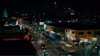 Movie still from “I Love You, Man” (2009), directed by John Hamburg – A city street at night lit up by streetlights; Extreme Wide shot, High angle
