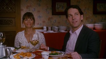 Movie still from “I Love You, Man” (2009), directed by John Hamburg – A man and a woman sitting at a dinner table; Medium shot, Over the shoulder angle