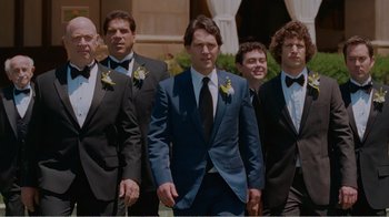 Movie still from “I Love You, Man” (2009), directed by John Hamburg – A group of men standing next to each other wearing tuxedos; Medium shot, Low angle