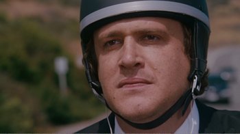 Movie still from “I Love You, Man” (2009), directed by John Hamburg – A person wearing a motorcycle helmet; Close Up shot, Low angle