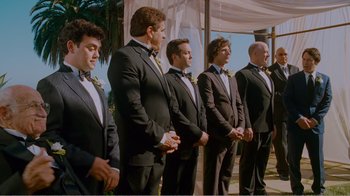 Movie still from “I Love You, Man” (2009), directed by John Hamburg – A group of men standing next to each other in tuxedos; Wide shot, Over the shoulder angle