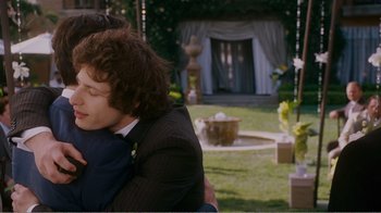 Movie still from “I Love You, Man” (2009), directed by John Hamburg – A man sitting in a chair next to a fountain; Close Up shot, Over the shoulder angle