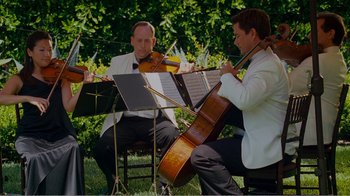 Movie still from “I Love You, Man” (2009), directed by John Hamburg – A couple of people that are playing some instruments; Wide shot, Low angle