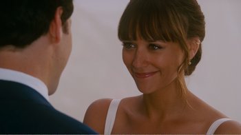 Movie still from “I Love You, Man” (2009), directed by John Hamburg – A man and a woman smiling at each other; Close Up shot, Over the shoulder angle