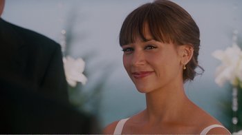 Movie still from “I Love You, Man” (2009), directed by John Hamburg – A person smiling for the camera; Close Up shot, Over the shoulder angle