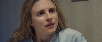 Movie still from “I Origins” (2014), directed by Mike Cahill – A person with long blonde hair; Close Up shot, Over the shoulder angle