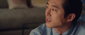 Movie still from “I Origins” (2014), directed by Mike Cahill – A person wearing a blue dress shirt; Close Up shot, Over the shoulder angle